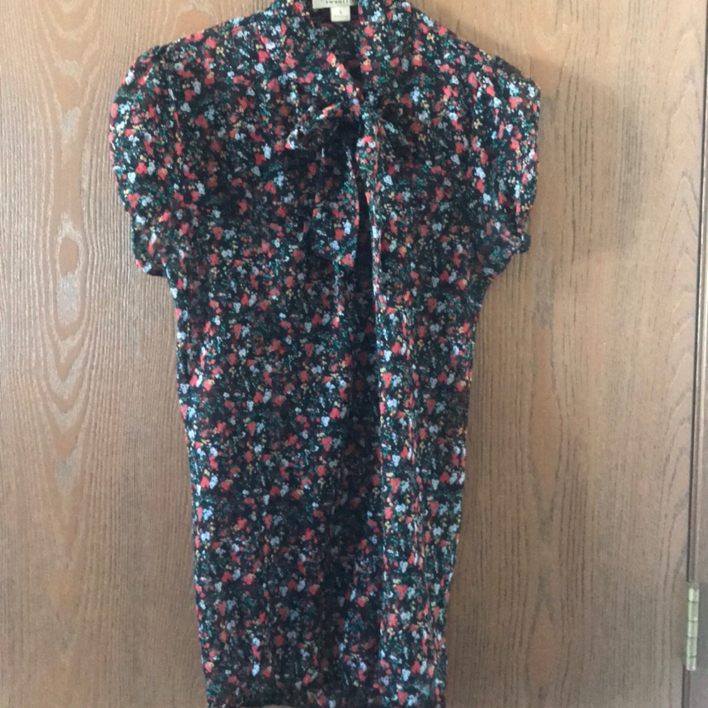 Black flowered top.